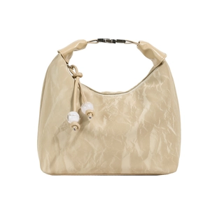 Beige pleated leather dumpling bag with decorative beads and metallic buckle detail