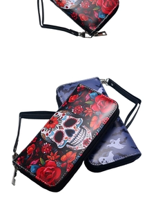 Three long zip wallets featuring sugar skull rose and ghost bat patterns with wrist straps