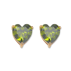Detail view of heart-shaped emerald green zircon earrings with golden 3-prong settings