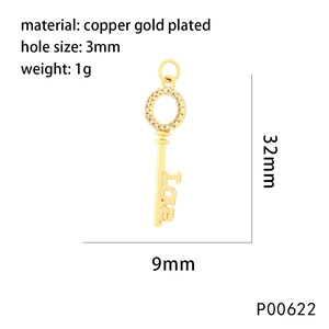 Gold plated copper key pendant with Love engraving and cubic zirconia moon inlay