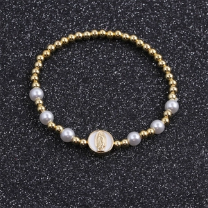 Bohemian copper bead and pearl bracelet with Virgin Mary Guadalupe charm on black base