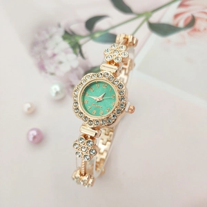 Elegant rose gold women's quartz watch with green dial and sparkling crystal bezel