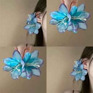 Detailed views of realistic lily hair clip with blue and purple gradient petals