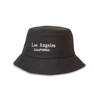 Detailed close-up of Los Angeles embroidery on black cotton kids fisherman bucket hat