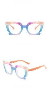 Close-up of cat-eye glasses frame with blue and purple abstract swirl pattern