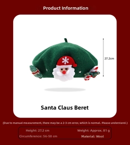 Detail of wool Christmas beret in forest green featuring Santa and snowflake embroidery