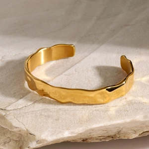 18K gold-plated stainless steel wide open cuff with textured irregular wave pattern