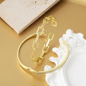 Elegant gold plated heart bracelets with sparkling zircons and geometric chain design