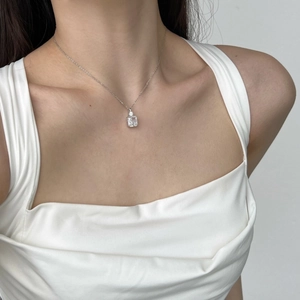 Close-up of a S925 sterling silver necklace featuring a rectangular ice-cut crystal pendant