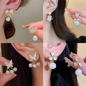 Elegant heart and butterfly pearl stud earrings with zircon crystals in four styles