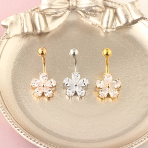 Floral zircon belly button rings in rose gold, silver, and gold three-piece set