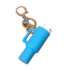 Miniature blue tumbler keychain with white straw, gold hardware and blue butterfly charm