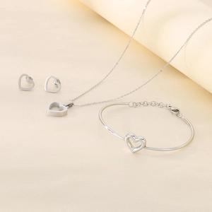 Ensemble de bijoux élégants en acier inoxydable argenté avec collier, bracelet et boucles d'oreilles