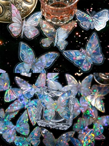 Detail of holographic butterfly stickers with gold foil edges and rainbow glass effect