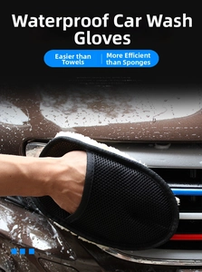 Detail showing hand wearing a dual-sided wool-like car wash glove cleaning a vehicle grille
