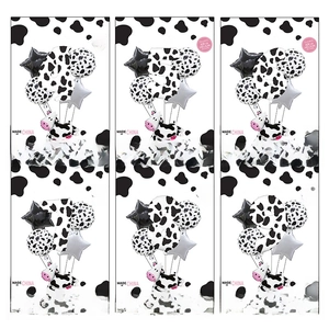 Cow print number balloons set for kids birthday party decoration with star shapes