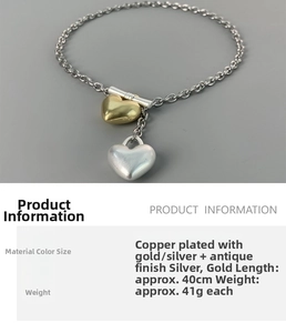 Detailed view of OT buckle heart pendant necklace with material and size specifications