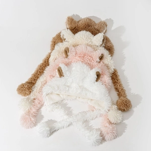 Cute fuzzy earflap bucket hat with sheep ears and pom-poms in four soft winter colors