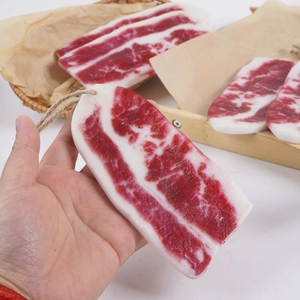 Realistic PVC artificial meat slice model with red and white marbled fat texture