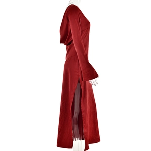 Detailed side view of a red satin hooded gown featuring long sleeves and a high side slit