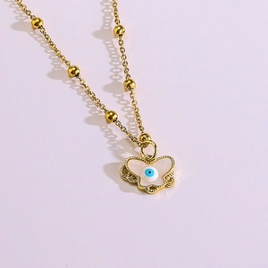 Minimalist 18K gold plated butterfly necklace with blue eye enamel pendant on violet background