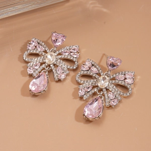 Boucles d'oreilles nœud vintage avec cristaux roses en forme de cœur et argent