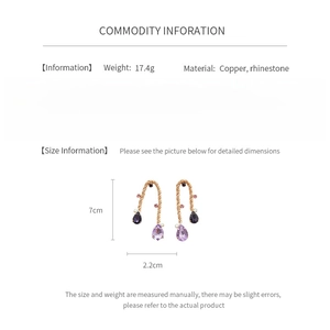 Detailed size and material specs for vintage metal mesh drop earrings with purple rhinestones