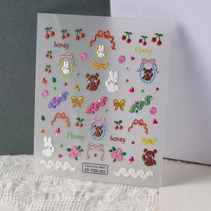 Détail macro de stickers ongles 5D avec motifs de lapins, ours et nœuds de dessin animé