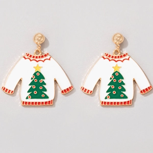 Close-up of Christmas sweater earrings with green tree design and golden ball hooks