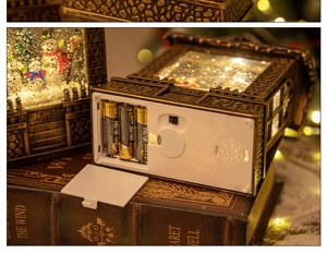Detail of Christmas lantern base showing 3 AA batteries compartment for power supply