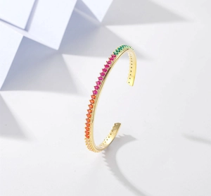Detailed macro view of S925 hallmark on colorful zircon gold-plated open bangle