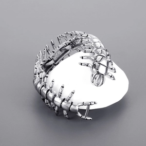 Gothic silver stainless steel centipede bracelet wrapped around a decorative white stone