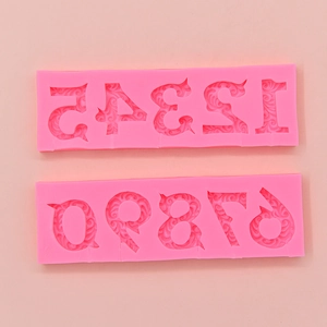 Pink silicone number molds 0-9 with vintage floral textures for cake decorating