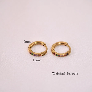 Macro detail of 12mm 14K gold plated earrings with colorful micro-pave zircons