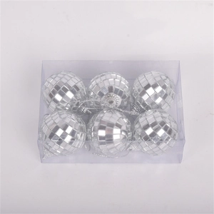 Detailed view of six silver mirror disco ball cake toppers in clear plastic packaging