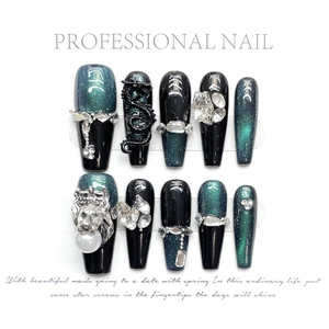 Gothic long press-on nails set featuring dark green cat eye effects with 3D dragon and lion