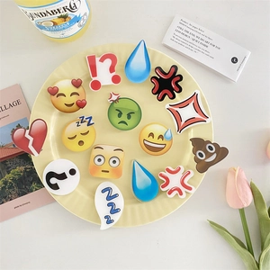 Cute emoji acrylic hair clips set featuring funny water drop and peach shapes on a yellow plate