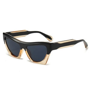 Chic two-tone cat eye sunglasses with black and amber frames for a retro fashion look