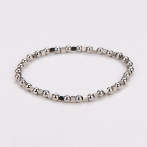 Minimalist silver beaded stainless steel bracelet with square and round geometric beads