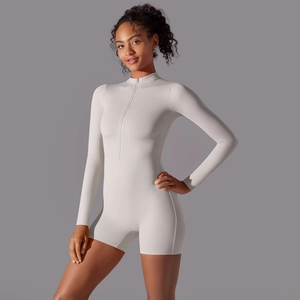 Detail of grey half-zip stand collar on a slim-fit athletic long-sleeve bodysuit