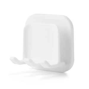 Wall-mounted white plastic toothbrush holder for bathroom storage with triple hook design