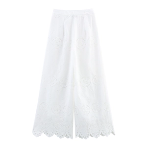 Women's white wide-leg trousers with hollow embroidery and scalloped hem design