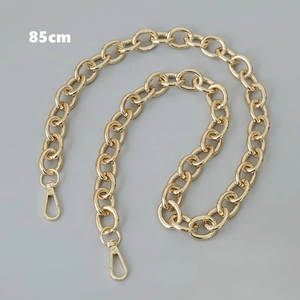 Detailed view of 85cm gold chunky chain strap with dual lobster clasps for handbags