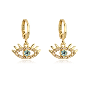Detail shot of 18K gold plated evil eye earrings with blue and clear zircon crystals