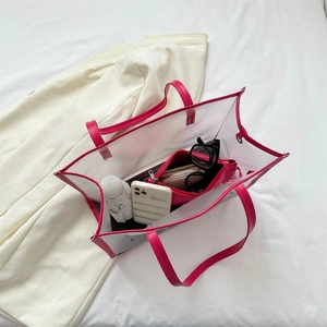 Transparent rose red tote bag showing high capacity storage for daily essentials