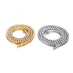 Sparkling gold and silver tennis necklaces with round cubic zirconia on white background