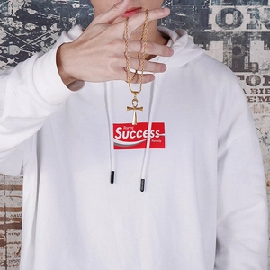 Golden Ankh cross pendant with twisted rope chain necklace worn by a model