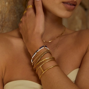 Hammered 18K gold stainless steel cuff bracelet with layered beads and bohemian style