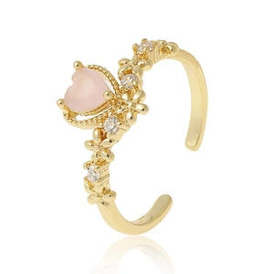 Elegant gold-plated ring with a pink heart-shaped crystal and floral zircon accents