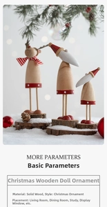 Close-up of wooden Christmas figures with reindeer and Santa designs in a snowy setting